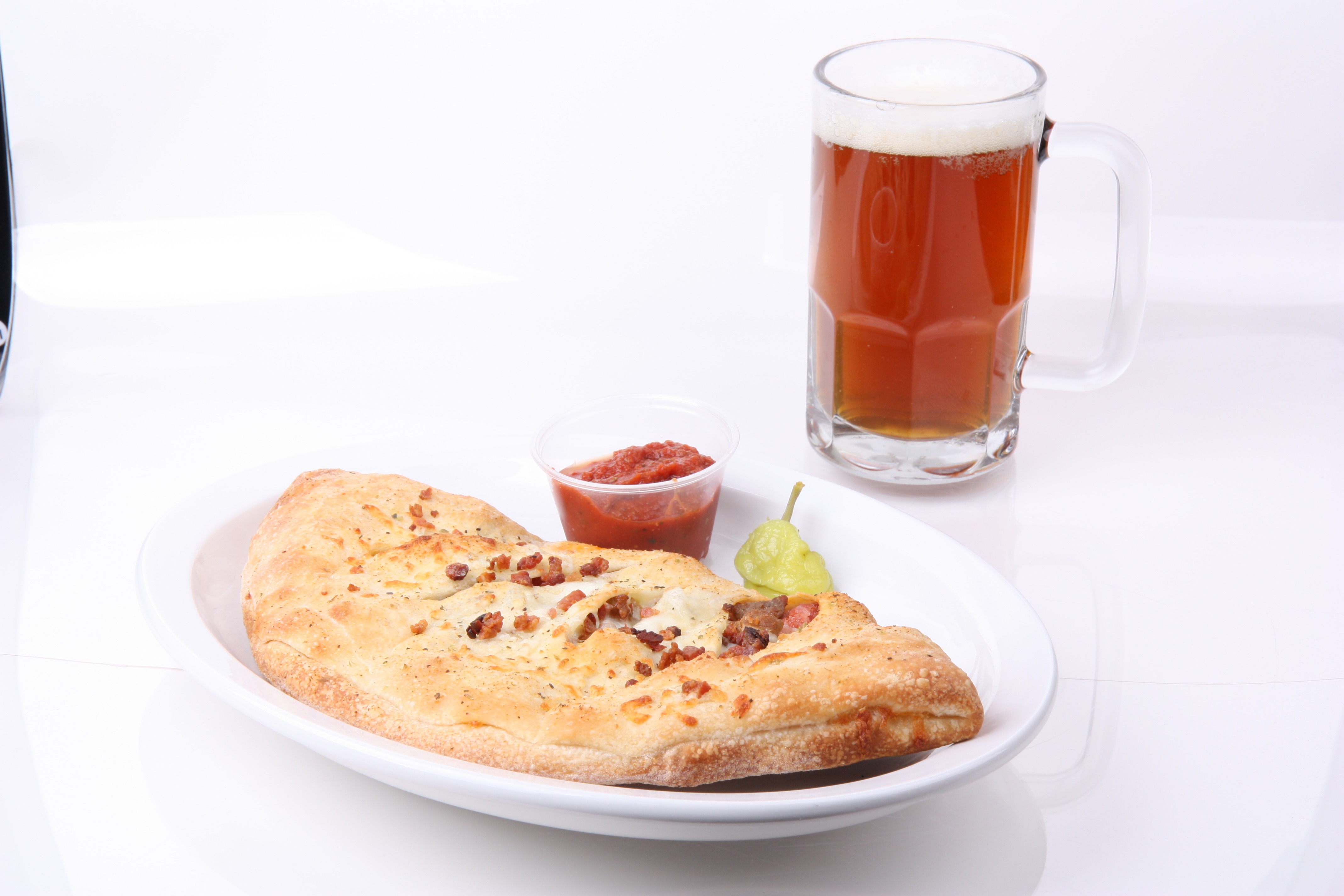 A bubbling pizza ready to slice